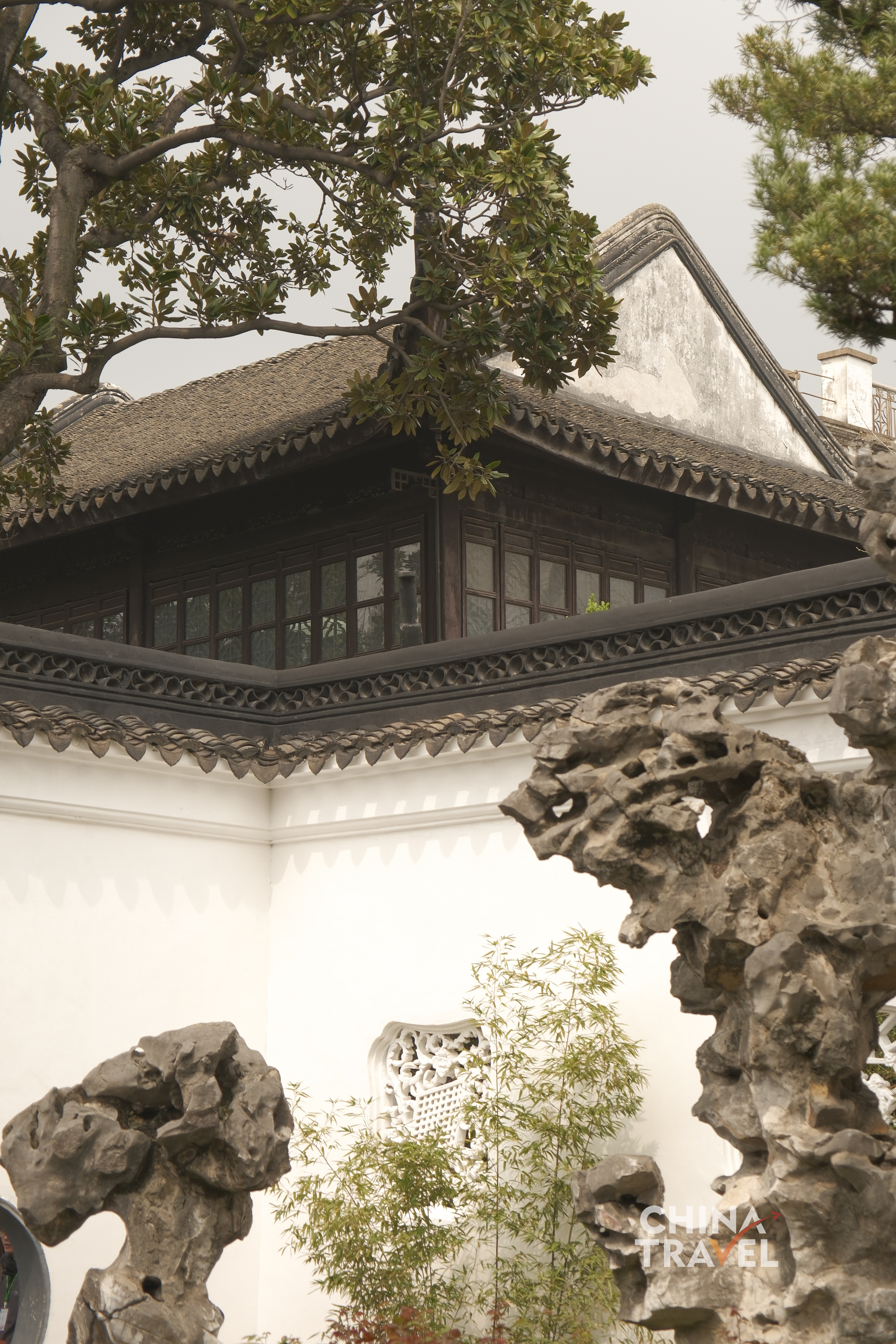Limestone rockeries, trees and pavilions form shifting compositions as visitors move through winding paths. /CGTN