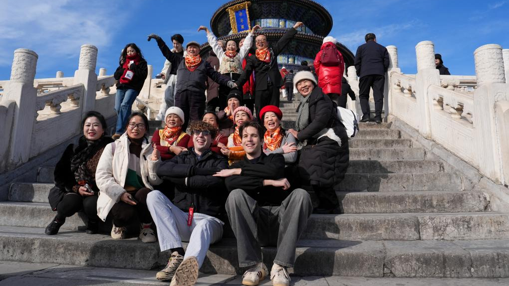 Tourists pose for photos at the Tiantan (Temple of Heaven) Park in Beijing, capital of China, January 7, 2026. /Xinhua