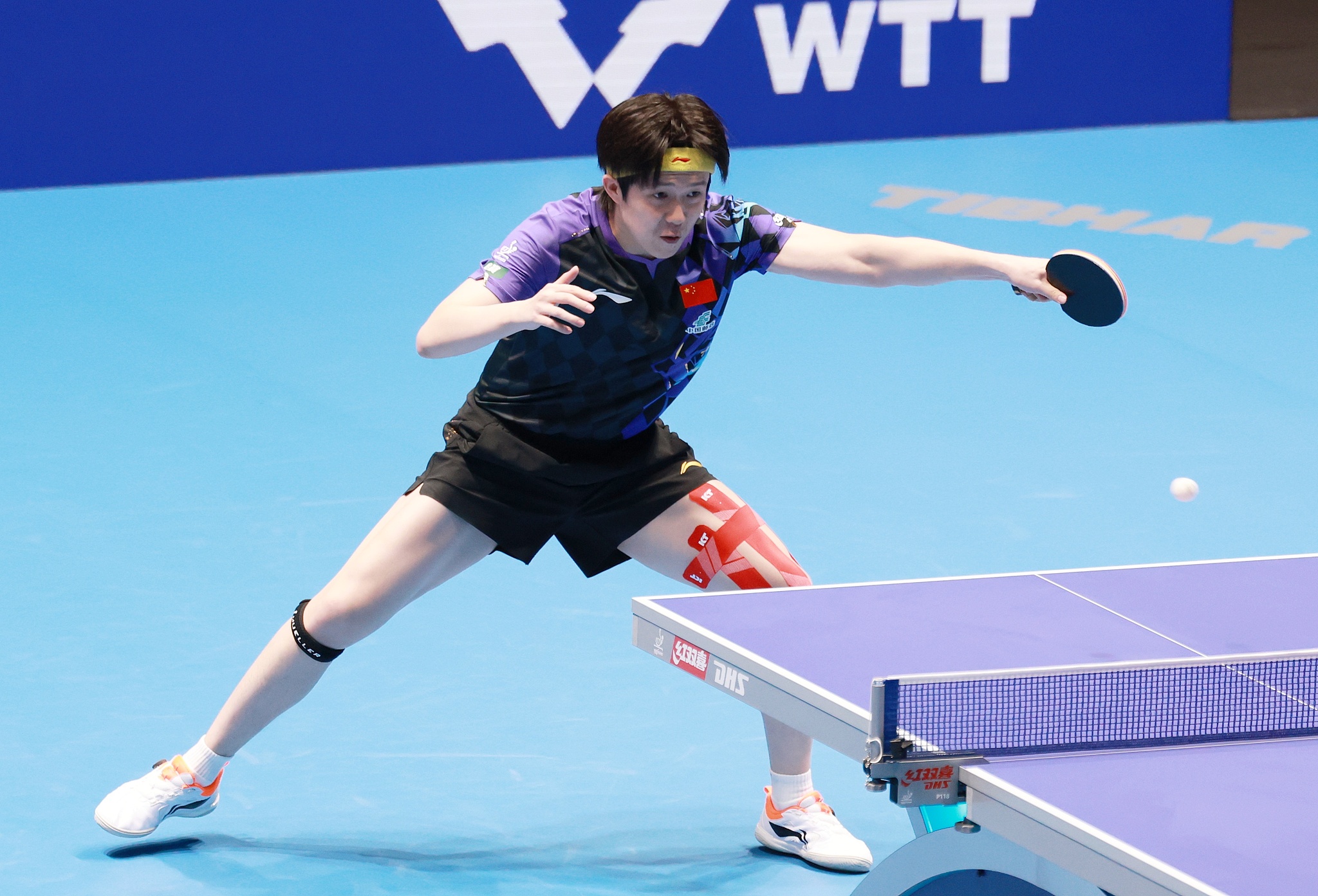 Wang Chuqin of China hits a shot in the match against Aditya Sareen of Australia at the ITTF World Team Table Tennis Championships Finals at OVO Arena Wembley in London, England, May 5, 2026. /VCG 