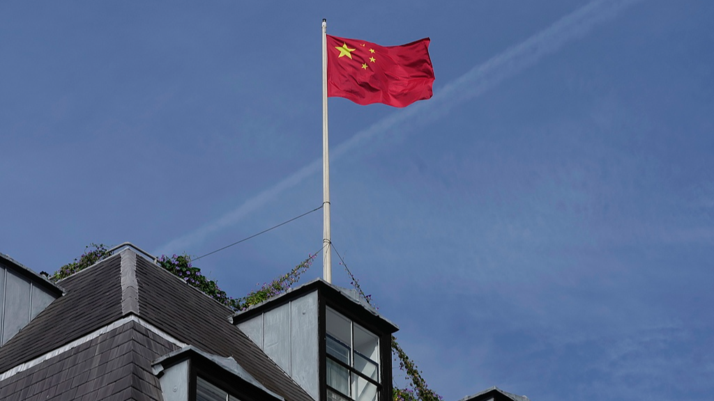 The Chinese national flag is raised at the Chinese embassy in London, September 11, 2023. /VCG