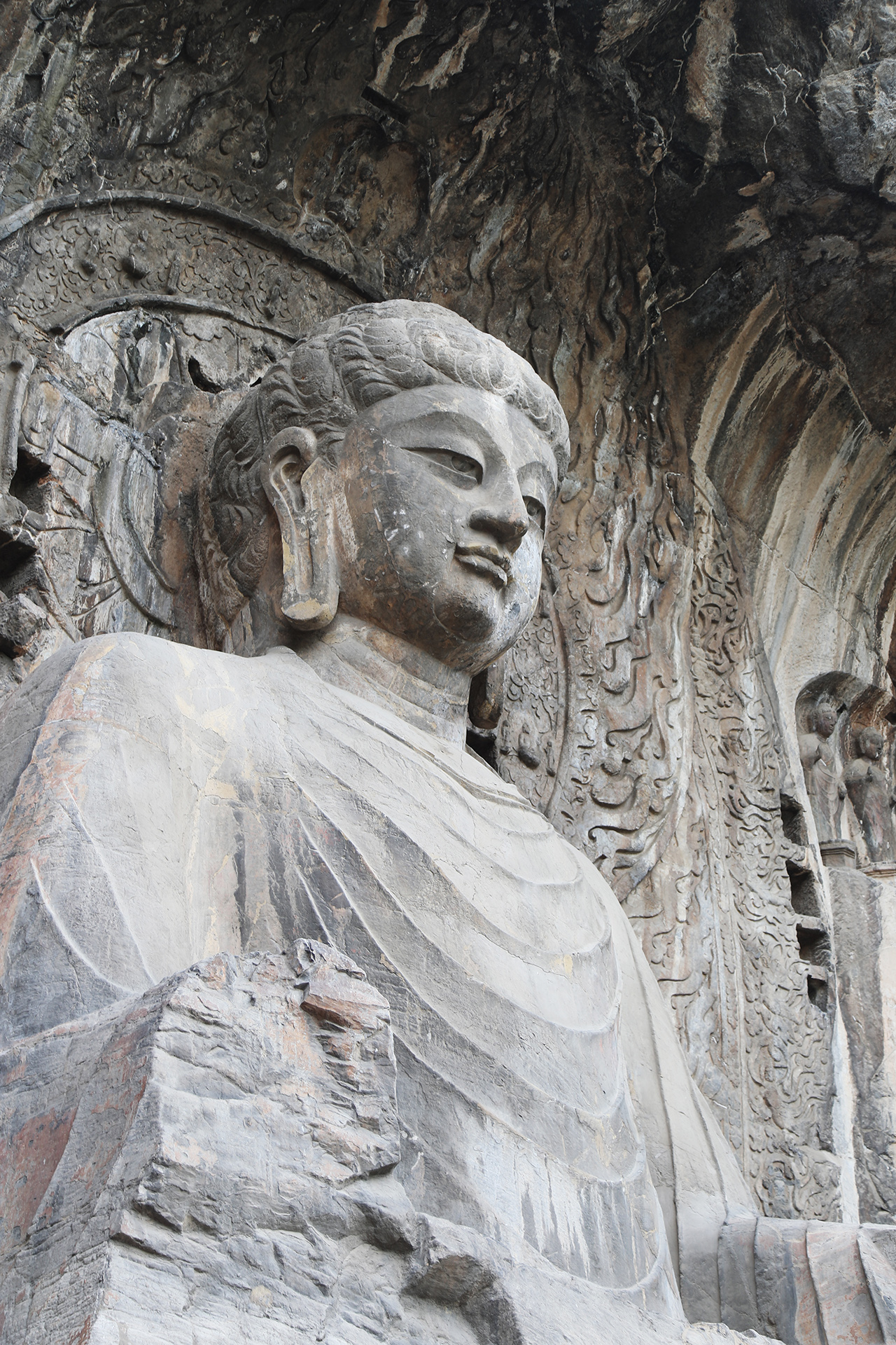 The Vairocana Buddha statue is seen at the Fengxian Temple at the Longmen Grottoes in Luoyang, Henan Province. /CGTN