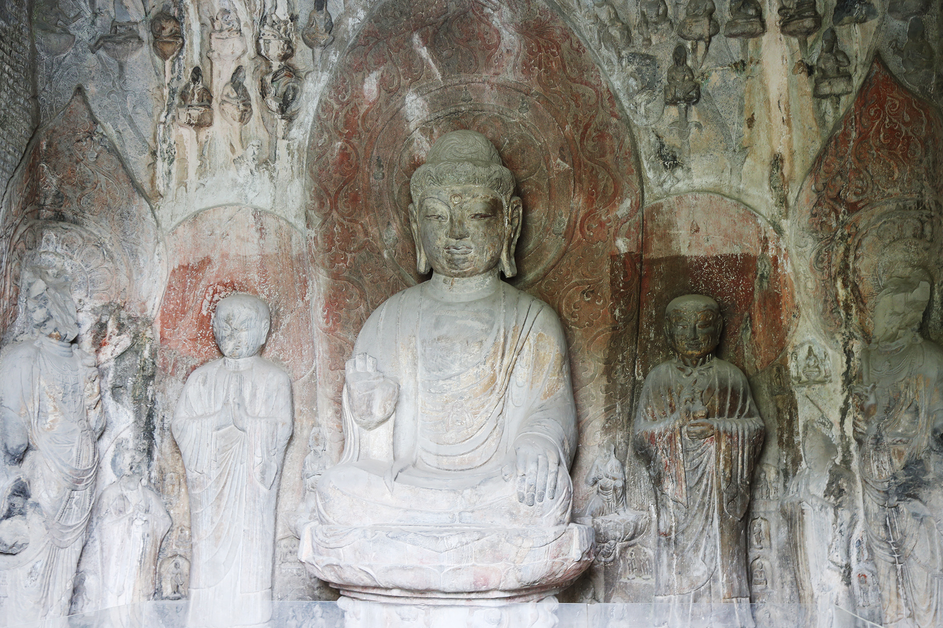 Statues are seen in a cave at the Longmen Grottoes in Luoyang, Henan Province. /CGTN