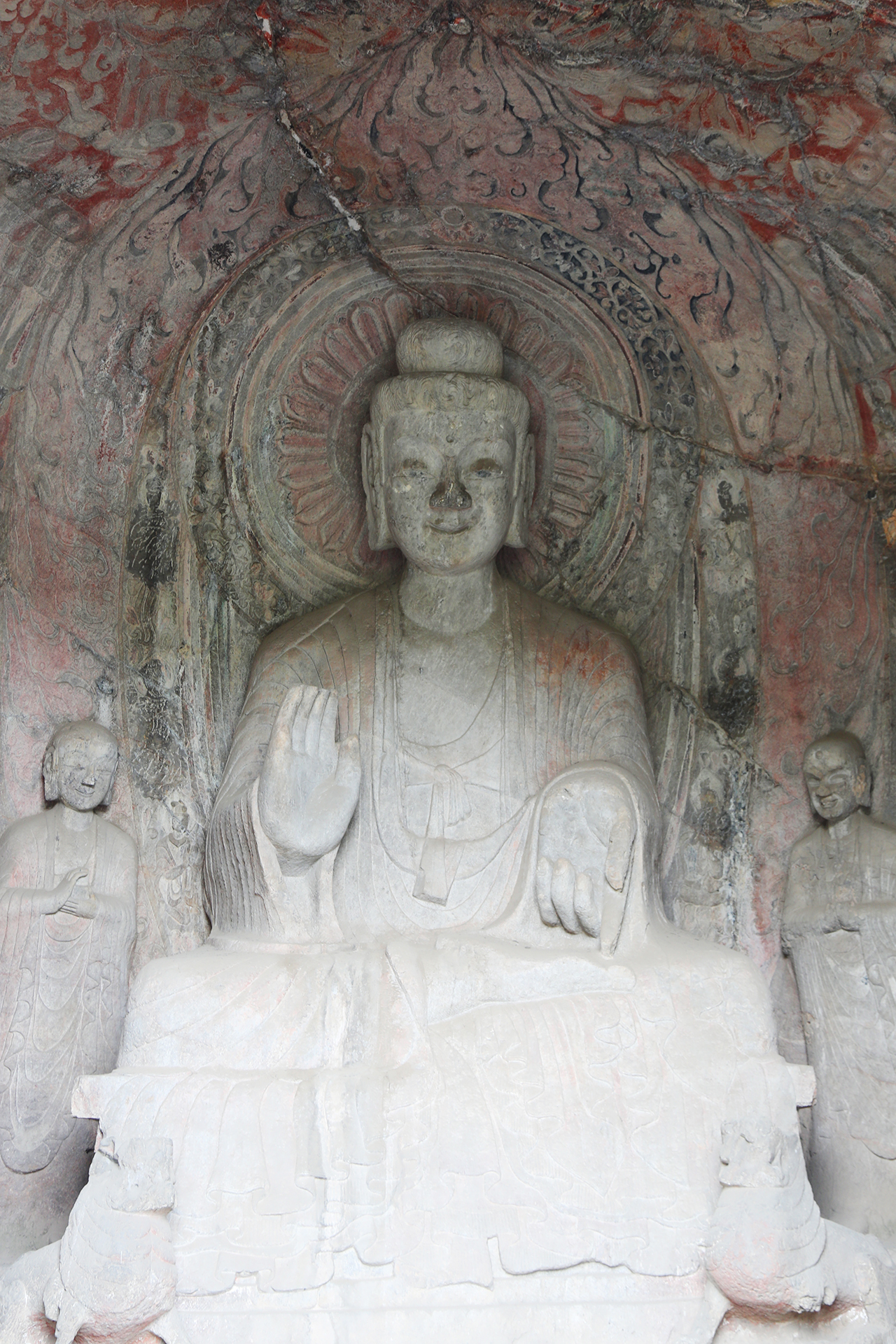 Statues are seen in a cave at the Longmen Grottoes in Luoyang, Henan Province. /CGTN