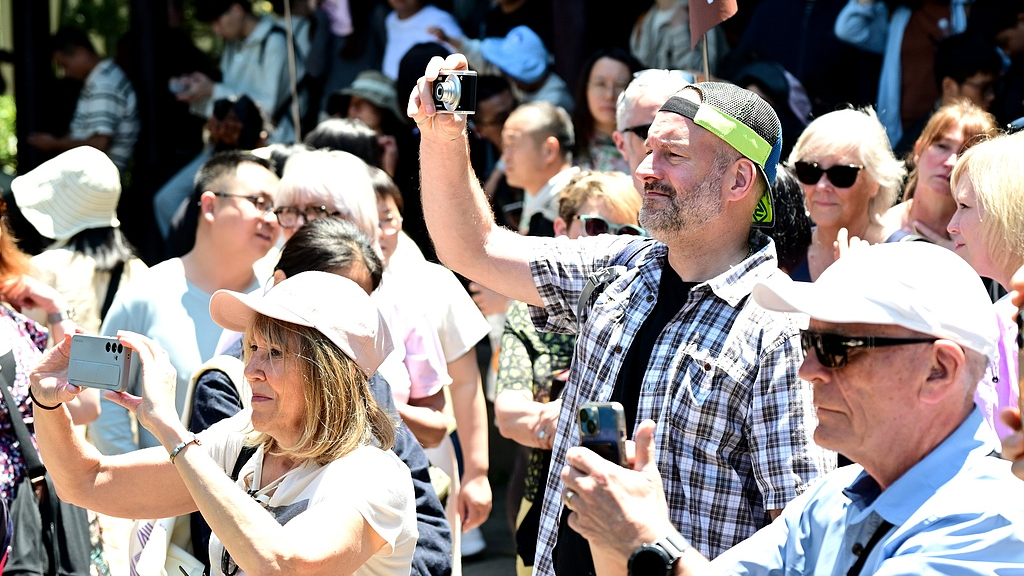International visitors marvel at China's modern, safe, welcoming vibe