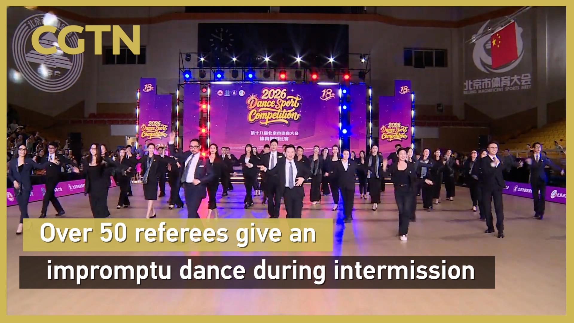 Over 50 referees give an impromptu dance during intermission