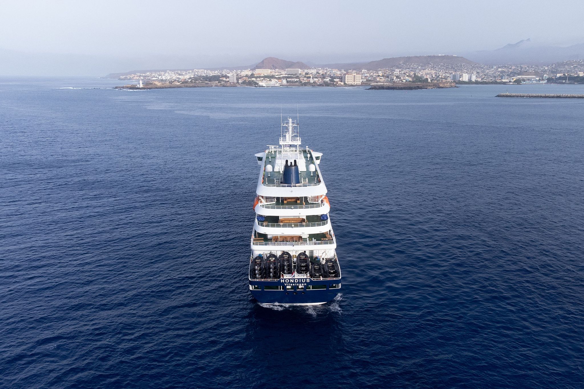 An aerial view shows the cruise ship MV Hondius stationary off the port of Praia, the capital of Cape Verde, May 5, 2026. /VCG