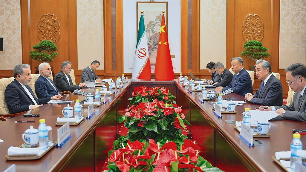 Chinese Foreign Minister Wang Yi (2nd R) holds talks with Iranian Foreign Minister Seyyed Abbas Araghchi (1st L) in Beijing, China, May 6, 2026. /Chinese Foreign Ministry