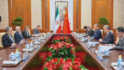 Chinese Foreign Minister Wang Yi, (2nd R), talks to his Iranian Counterpart Seyed Abbas Araghchi (L) during the bilateral meeting in Beijing, May 6, 2026. /Xinhua 