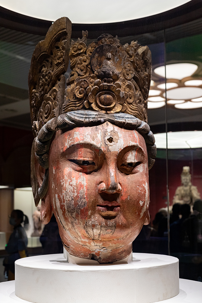 A painted wooden headed sculpture of Guanyin from the Song Dynasty housed at the National Museum of China in Beijing on March 12, 2024 /VCG