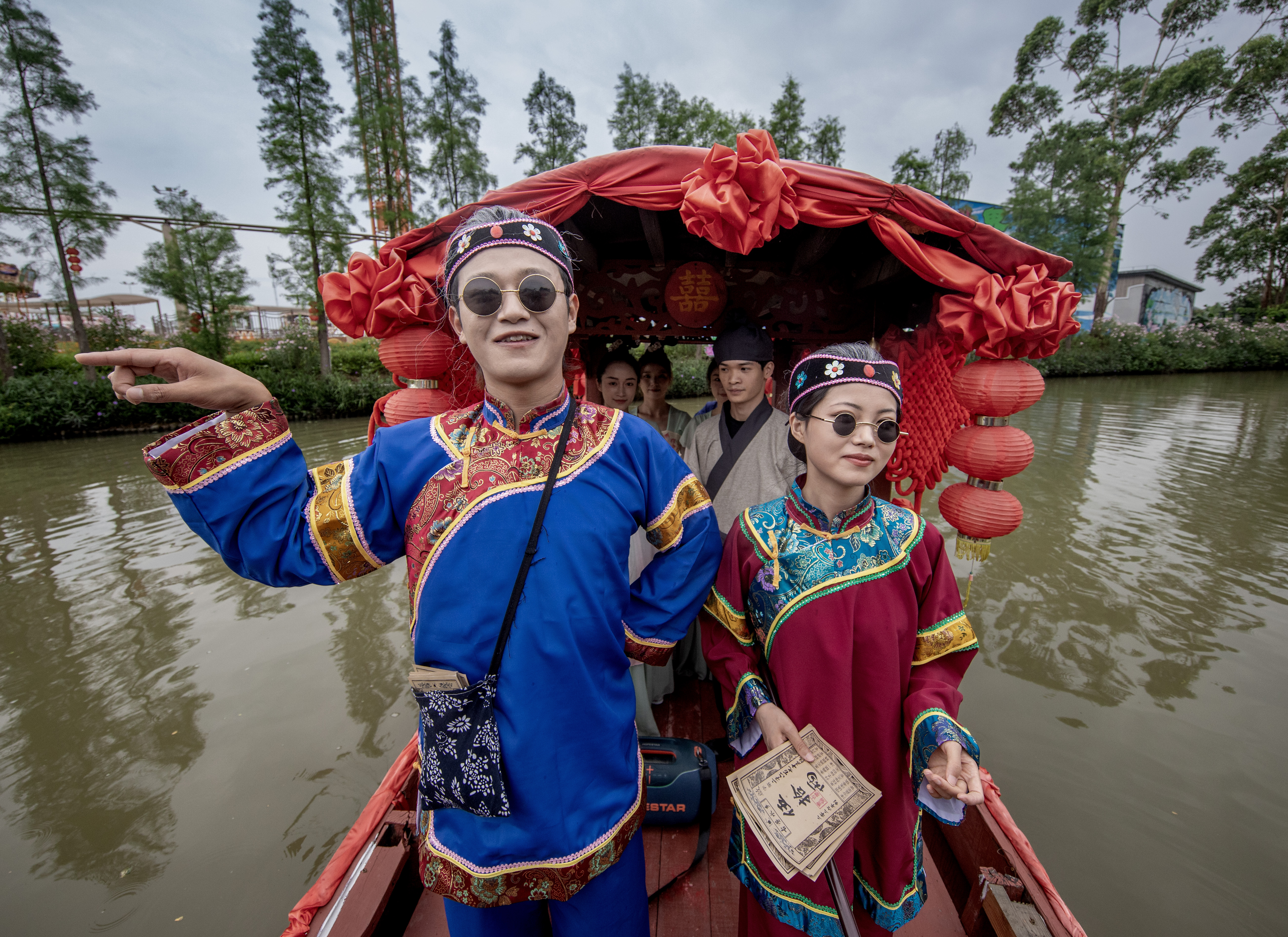 Ceremonial wedding rituals on water are seen at Gulao Water Town in Heshan City, south China's Guangdong Province on May 4, 2026. /IC