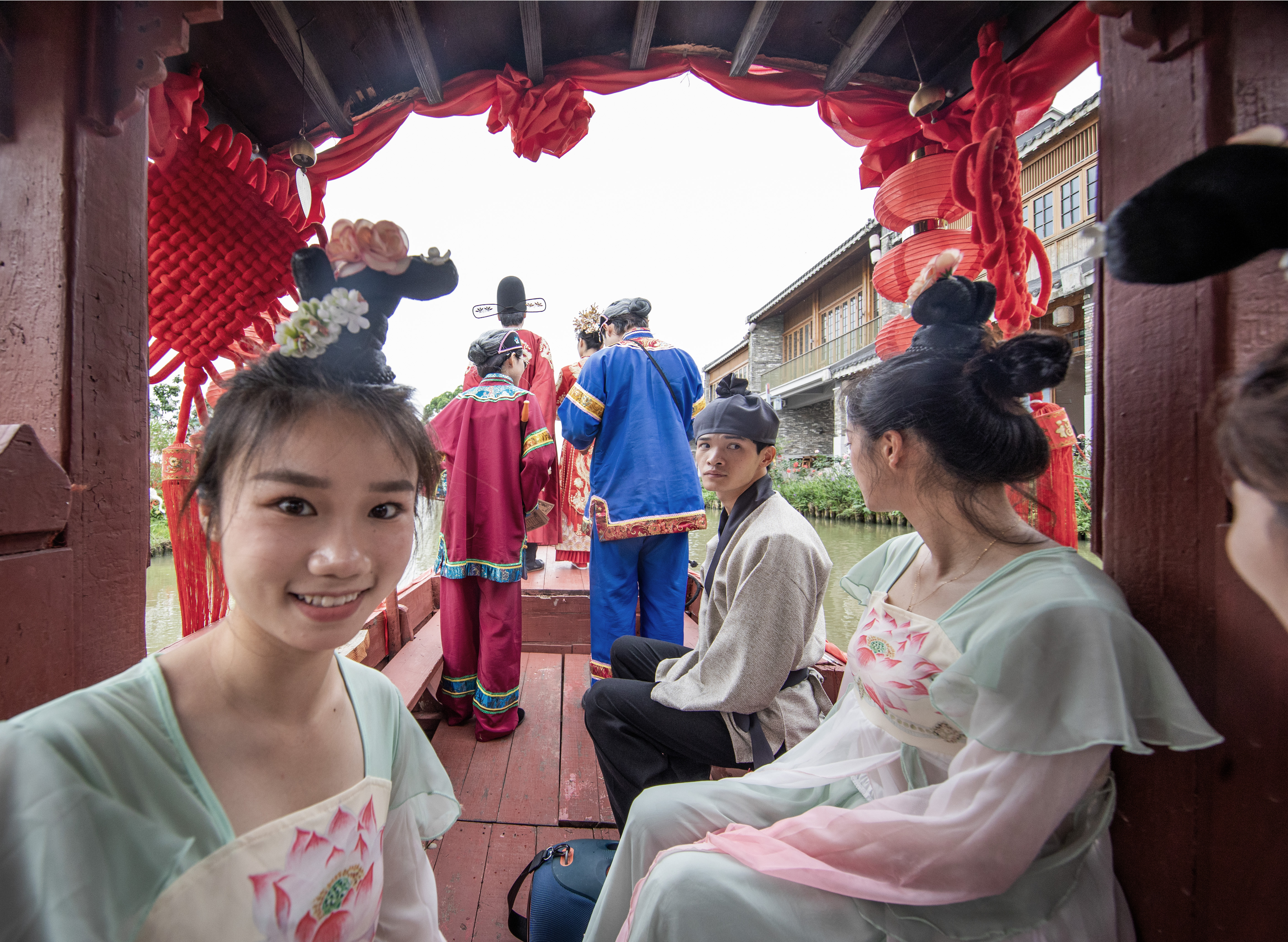 A water wedding performance is seen at Gulao Water Town in Heshan City, south China's Guangdong Province on May 4, 2026. /IC