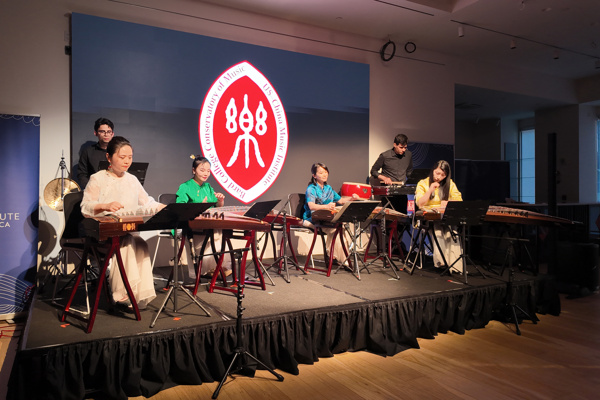 Xia Jing, left, joined young North American guzheng performers for an ensemble performance during the 