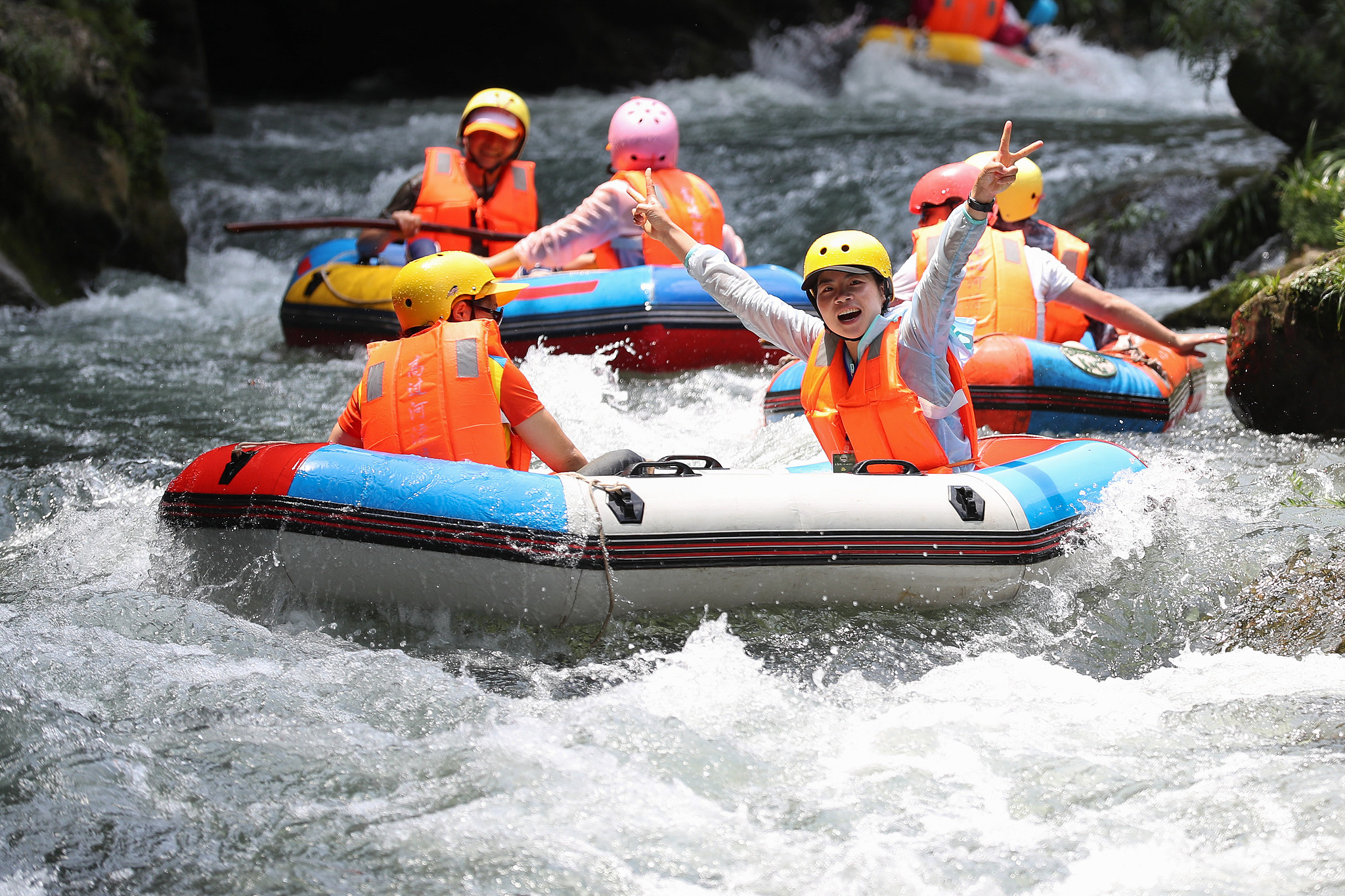 Tourists canyon rafting in Zhenyuan, Guizhou. /VCG
