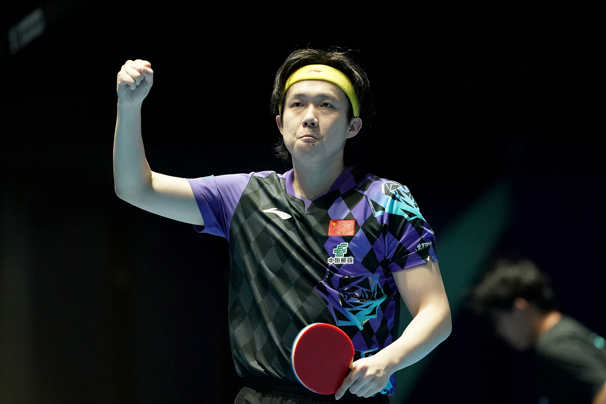 China's Wang Chuqin reacts after beating ROK's Oh Jun‑sung during the men's team quarterfinal match at the ITTF World Team Table Tennis Championship Finals in London, England, May 8, 2026. /VCG
