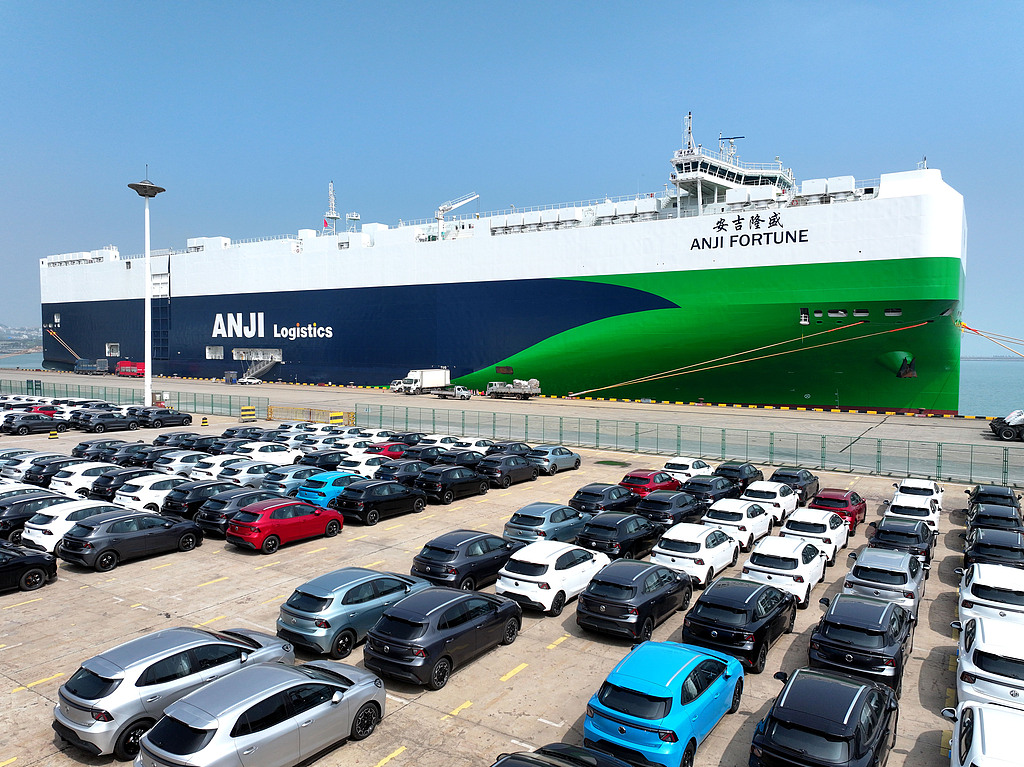 A Ro-Ro ship is docked at the berth, loading export cars at a port of Lianyungang City , Jiangsu Province, on April 10, 2026. /VCG