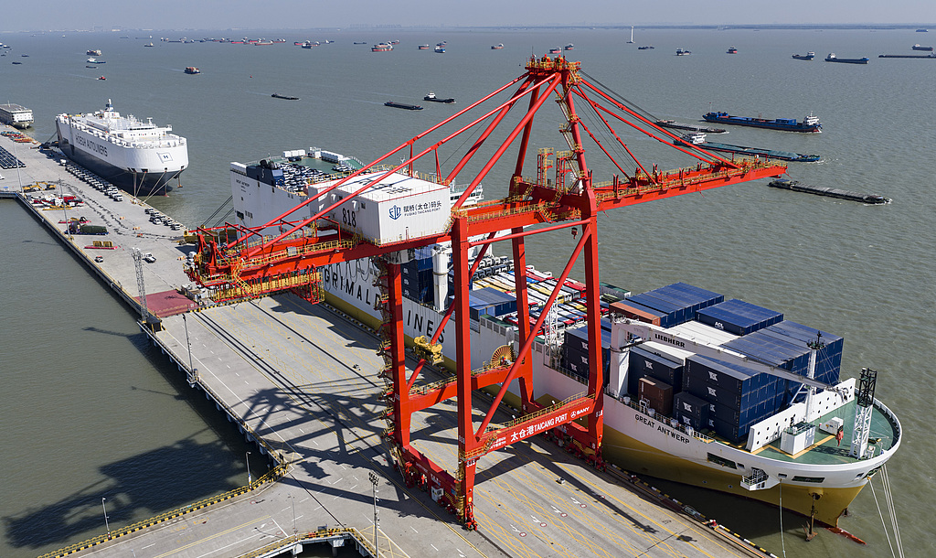 A car carrier ship loading cars for export at the Taicang Port Area of Suzhou Port, Jiangsu Province, China, May 10, 2026. /VCG