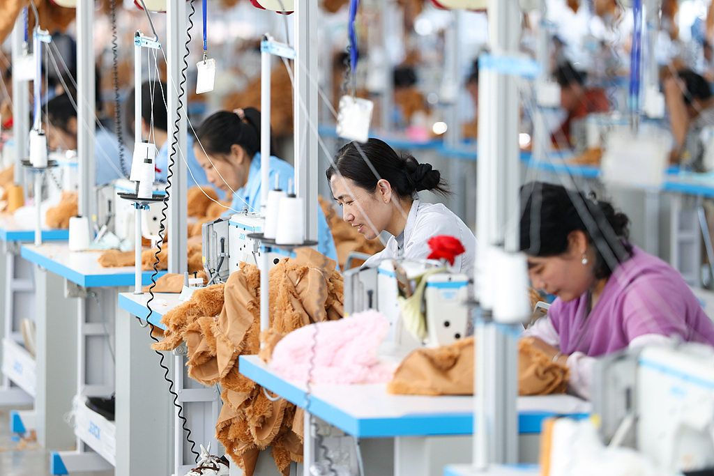 Workers at a toy enterprise in Shiqiao Town, Ganyu District, Lianyungang City, Jiangsu Province, manufacture plush toys for export on May 8, 2026. /VCG