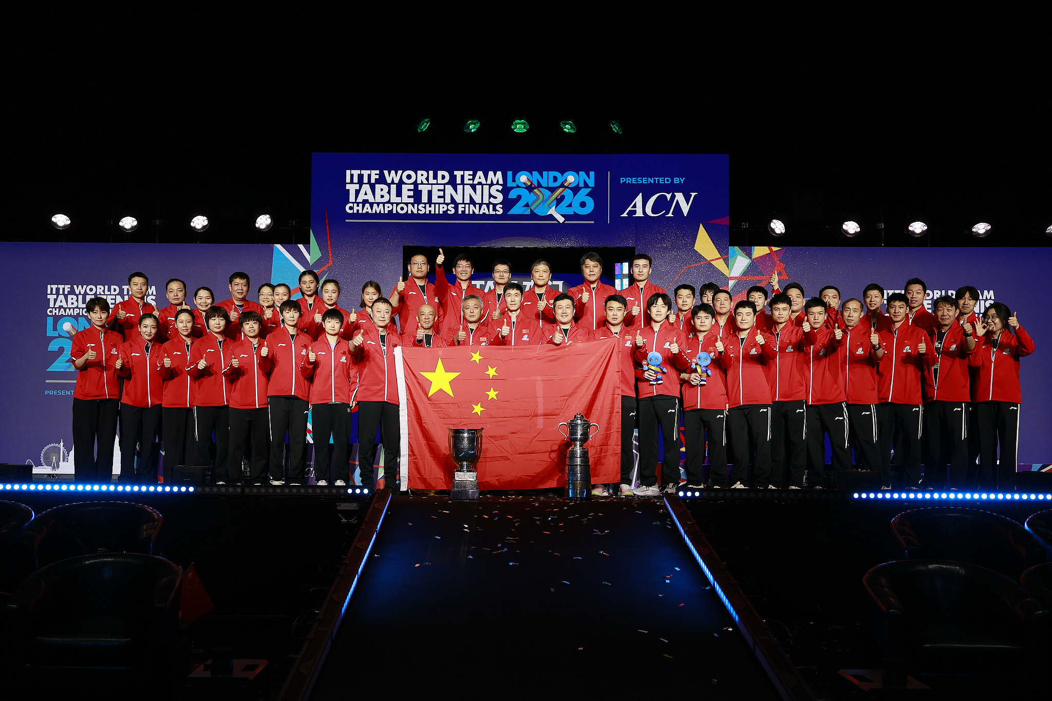 Team China celebrate during the awards ceremony of the men's and women's teams final match at the ITTF World Team Table Tennis Championship Finals in London, England, on May 10, 2026. /VCG