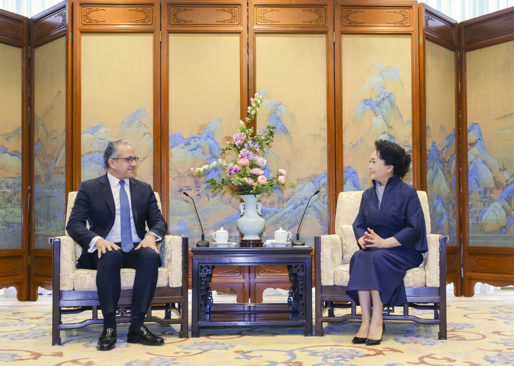 Peng Liyuan, wife of Chinese President Xi Jinping, meets with Khaled El-Enany, director-general of the United Nations Educational, Scientific and Cultural Organization (UNESCO) in Beijing, May 12, 2026. /CMG