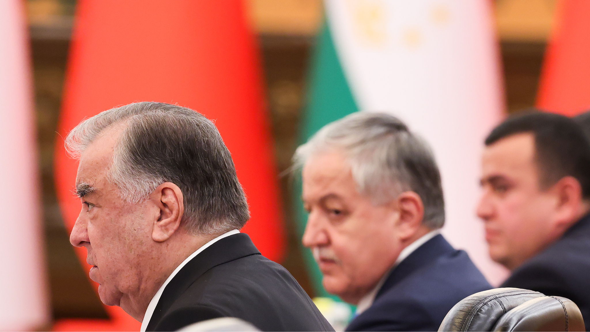 Tajikistan's President Emomali Rahmon (L) speaks during a meeting with Chinese President Xi Jinping at the Great Hall of the People in Beijing, China, May 12, 2026. /VCG
