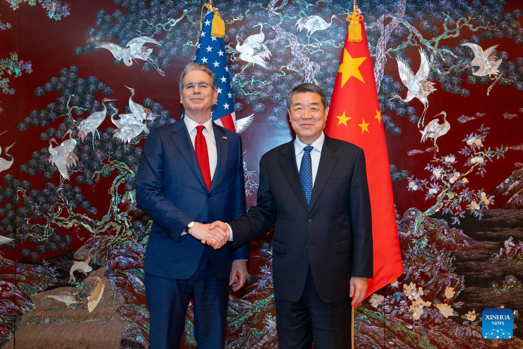 Chinese Vice Premier He Lifeng (R) shakes hands with US Treasury Secretary Scott Bessent prior to their consultations in the Republic of Korea, May 13, 2026. /Xinhua
