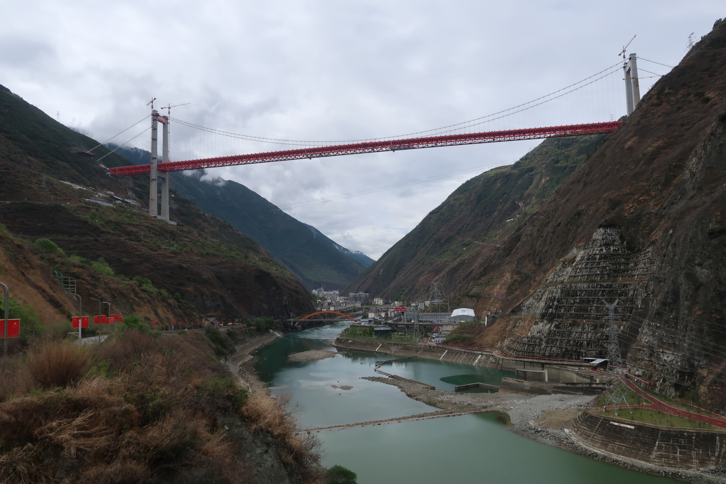 From Iron Chains to Steel Spans: The Bridges of Luding