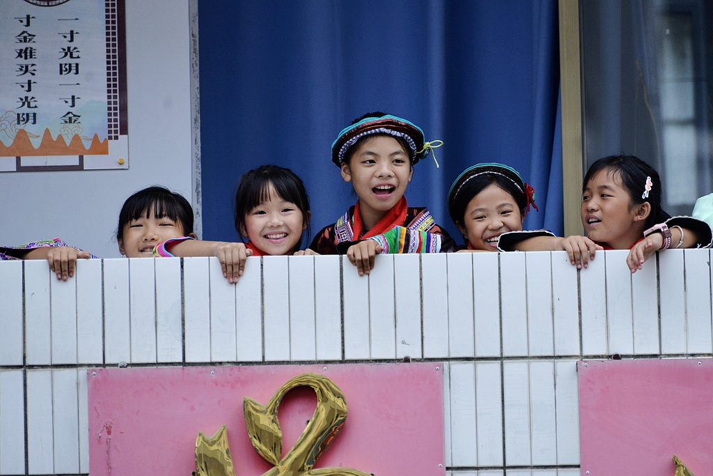 Students attend the opening class of the Spring Bud Girls' Class at Baiyun Central Primary School in Rongshui Miao Autonomous County, Guangxi Zhuang Autonomous Region, China, September 9, 2025. /VCG