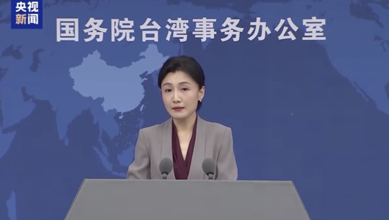 Zhang Han, a spokesperson for the State Council Taiwan Affairs Office, answers questions at a press briefing on May 13, 2026. /CMG