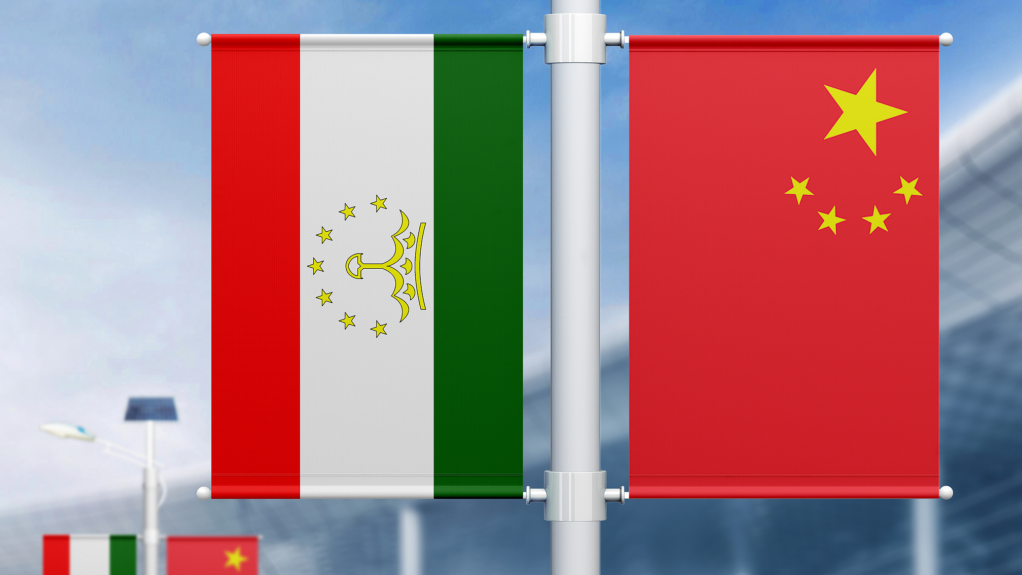 National flags of China (R) and Tajikistan. /VCG