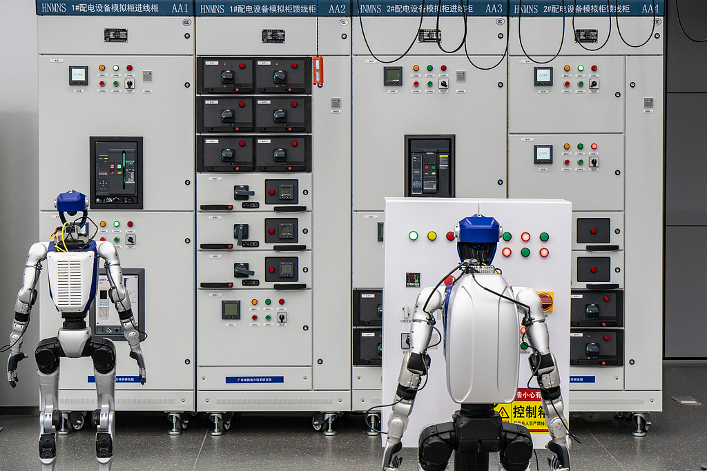 Humanoid robots at a lab of Guangdong Power Grid Co. for developing clean and intelligent power energy systems, Guangzhou, China, April 16, 2026. /CFP
