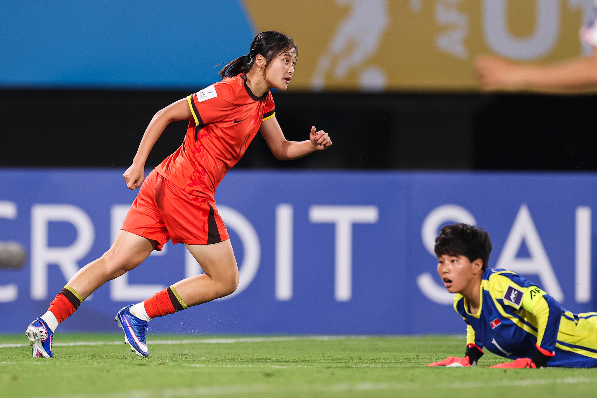 China's Liu Yuxi (L) during their clash with the DPRK at the U17 Women's Asian Cup in Suzhou, China, May 14, 2026. /VCG