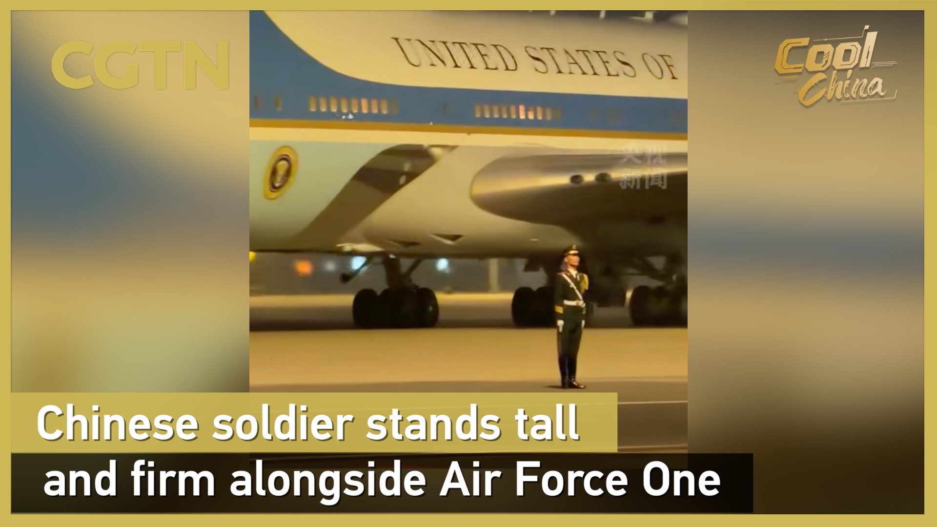 Chinese soldier stands tall and firm alongside Air Force One