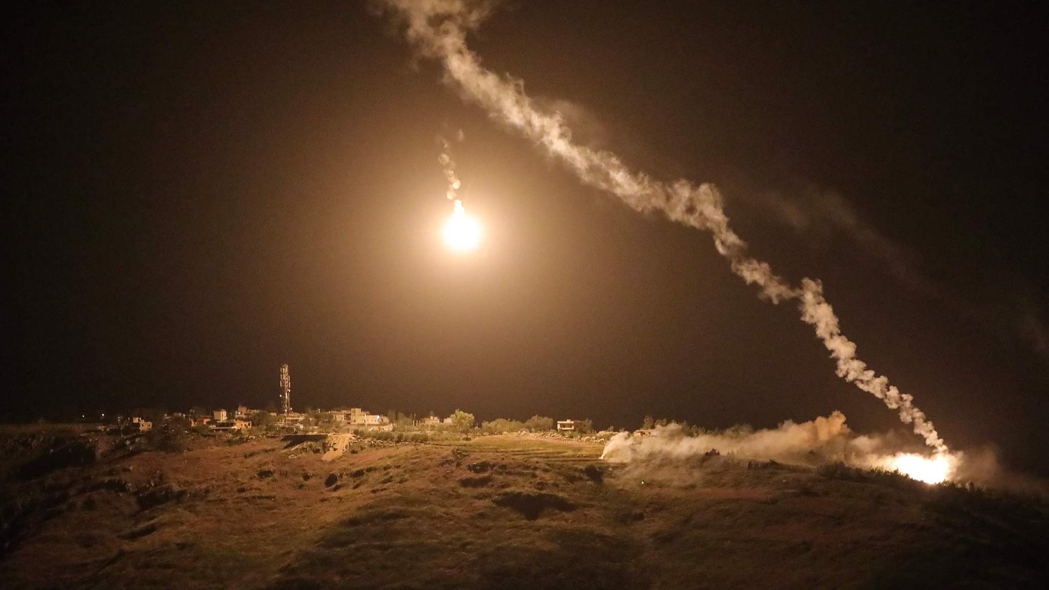 A photograph taken from the southern town of Marjayoun shows flares fired by the Israeli military in southern Lebanon late on May 13, 2026. /VCG