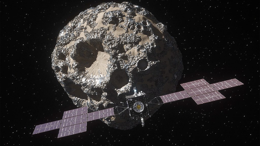 A video animation depicts the spacecraft Psyche approaching the asteroid Psyche. /VCG