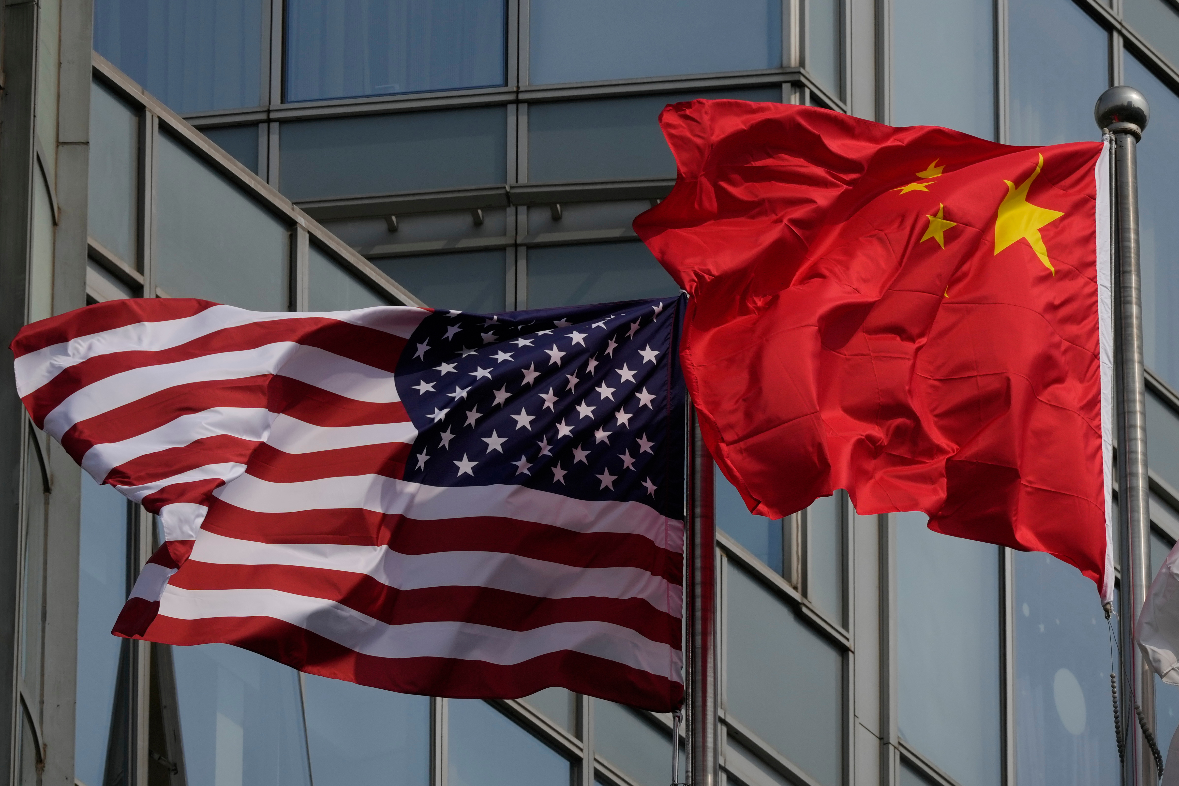 The national flags of the United States and China are flown outside a building in Beijing, China, May 13, 2026. /AP