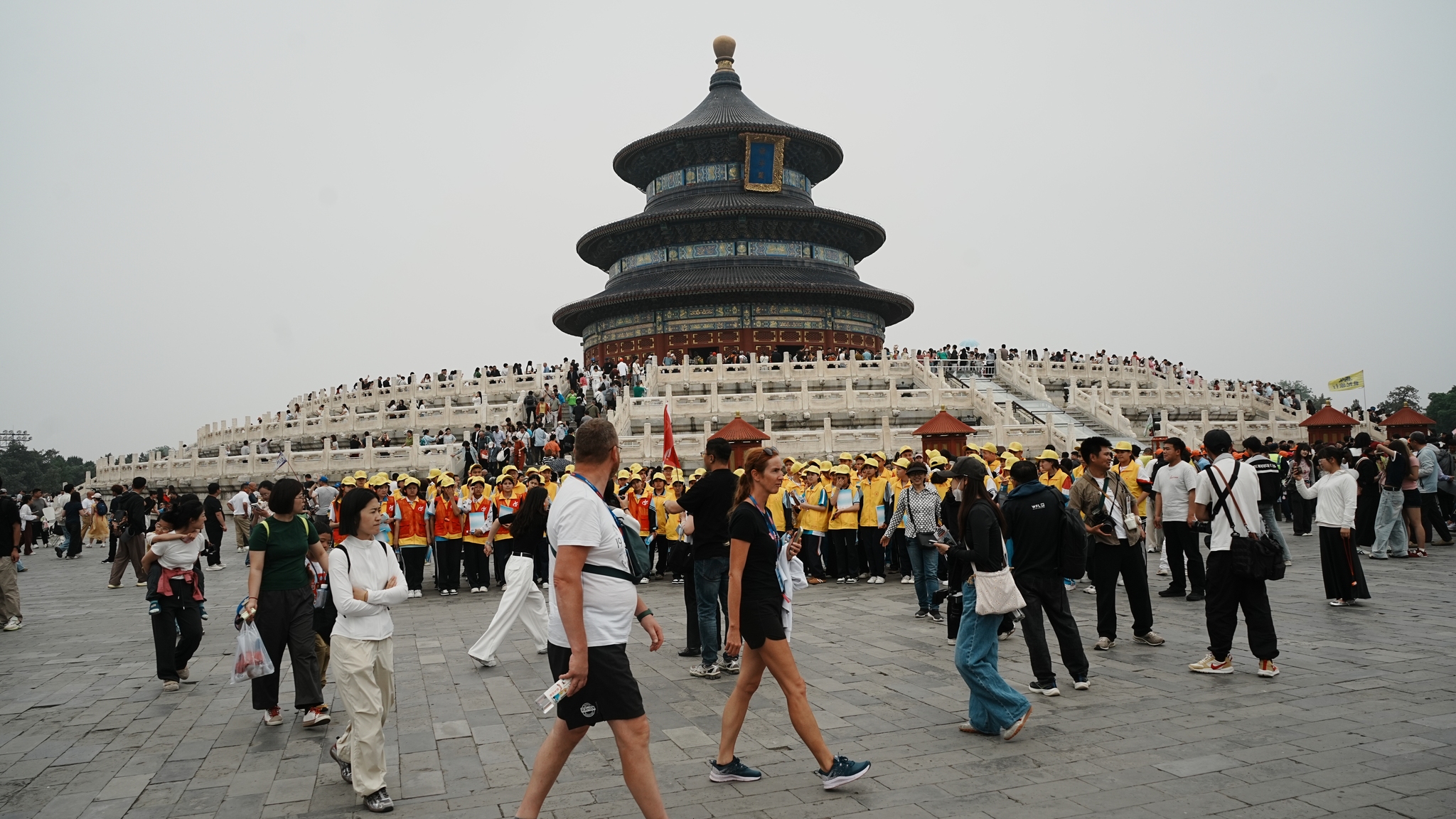 Tourists are pictured in front of the Hall of Prayer for Good Harvests at Beijing's Temple of Heaven on May 15, 2026. /VCG
