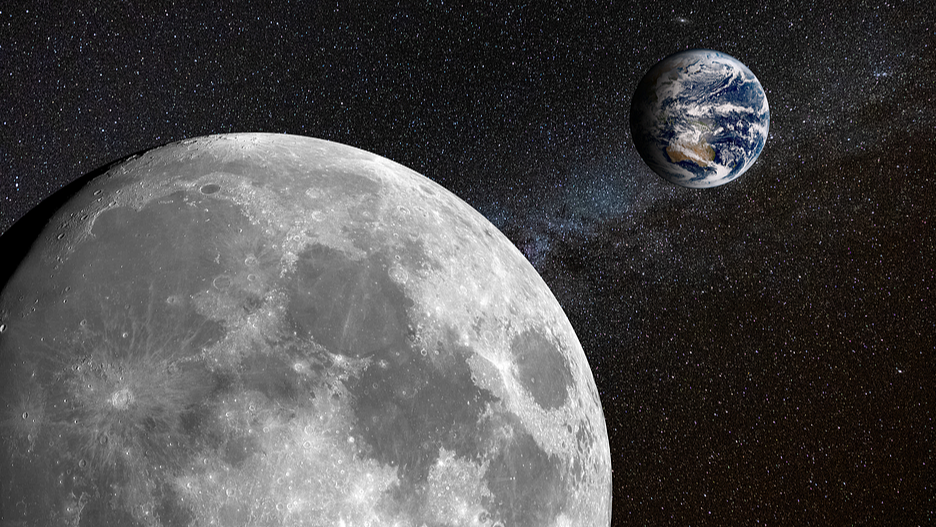 An illustration of Earth and the moon. /VCG