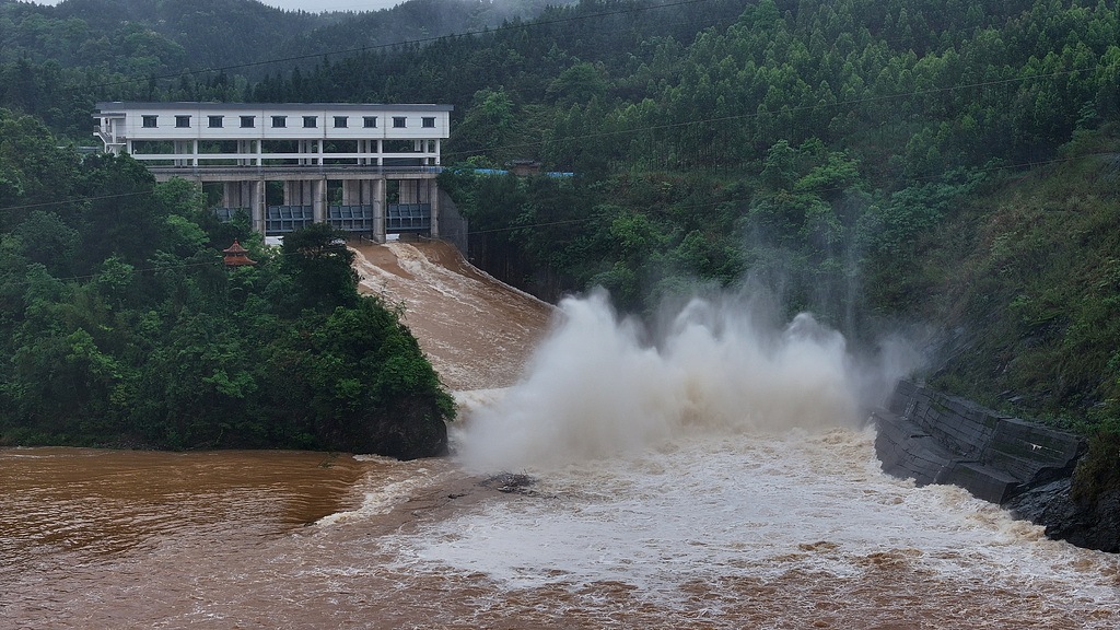 A reservoir in Liuzhou, south China's Guangxi Zhuang Autonomous Region, releases floodwater through its sluice gates, April 21, 2026. /VCG
