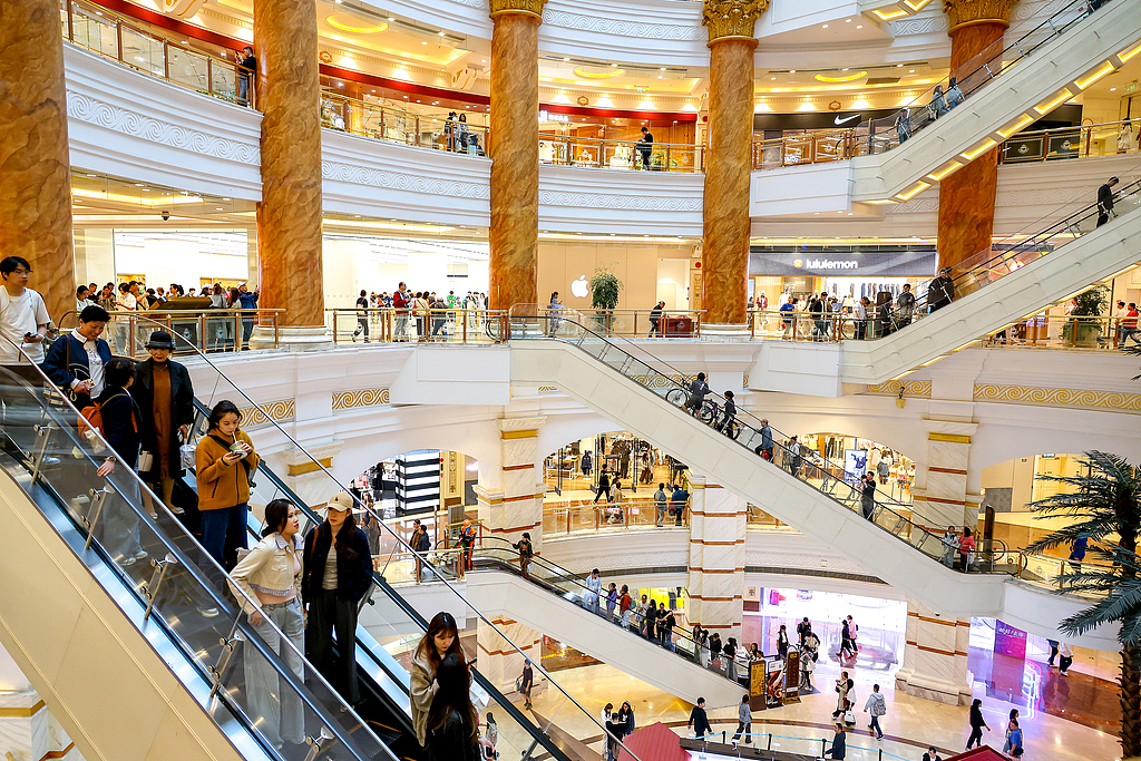 Shoppers at a shopping mall in Shanghai, China, May 2, 2026. /VCG