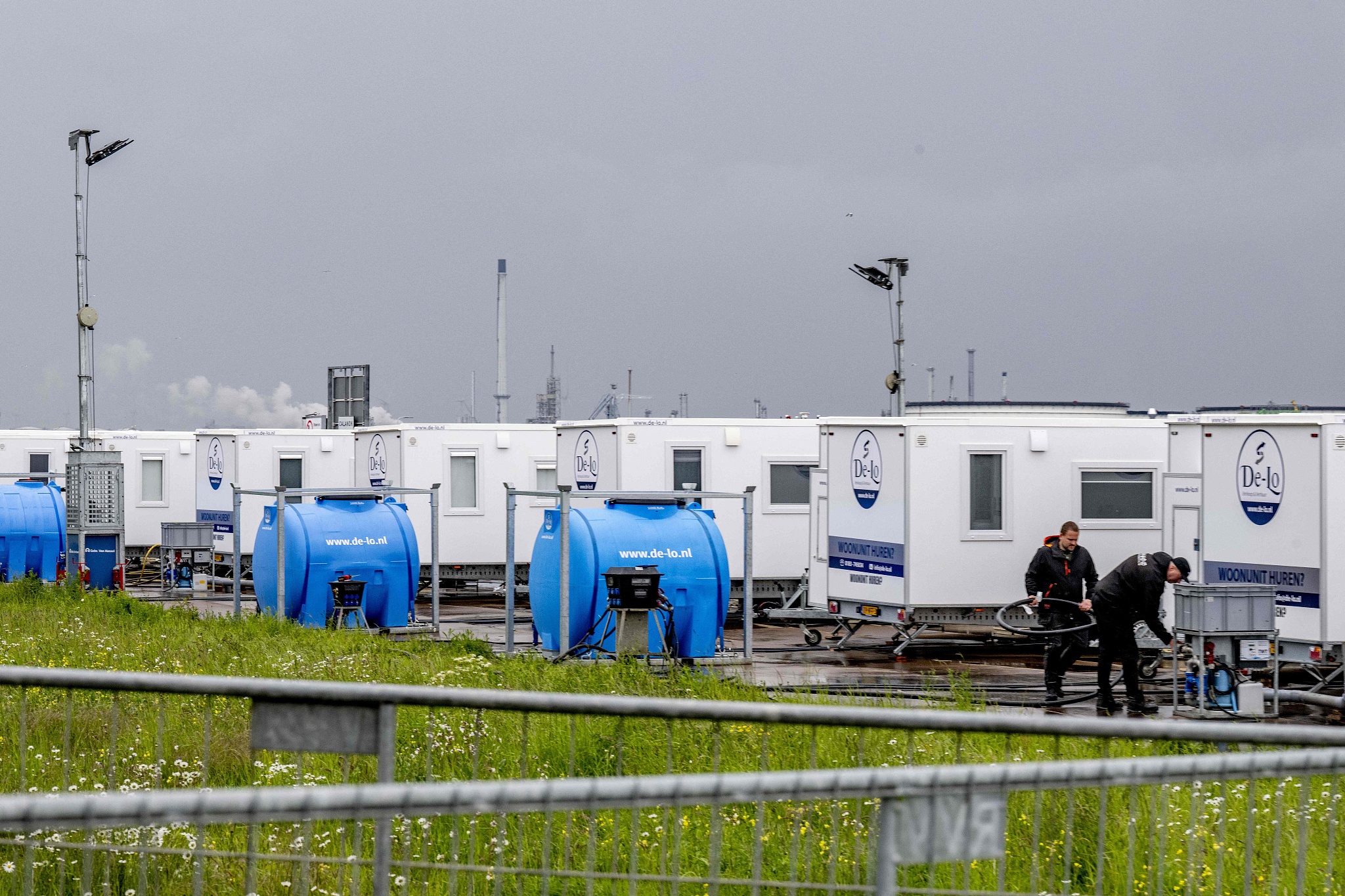 Officials check the equipment at the port of Rotterdam, which is prepared for the arrival of the Dutch Hantavirus-hit cruise ship MV Hondius where the ship's crew members will undergo a medical screening in Rotterdam, Netherlands, May 17, 2026. /VCG