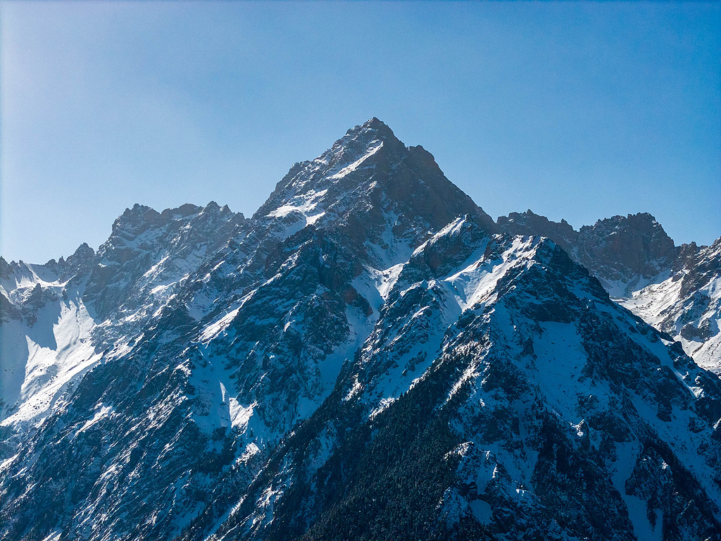 Snow-capped peaks tower over the Wanglang area of the Giant Panda National Park in Pingwu County, Mianyang City, southwest China's Sichuan Province, February 4, 2025. The region serves as a crucial ecological corridor and a high-altitude sanctuary for wild giant pandas and other endangered wildlife. /VCG