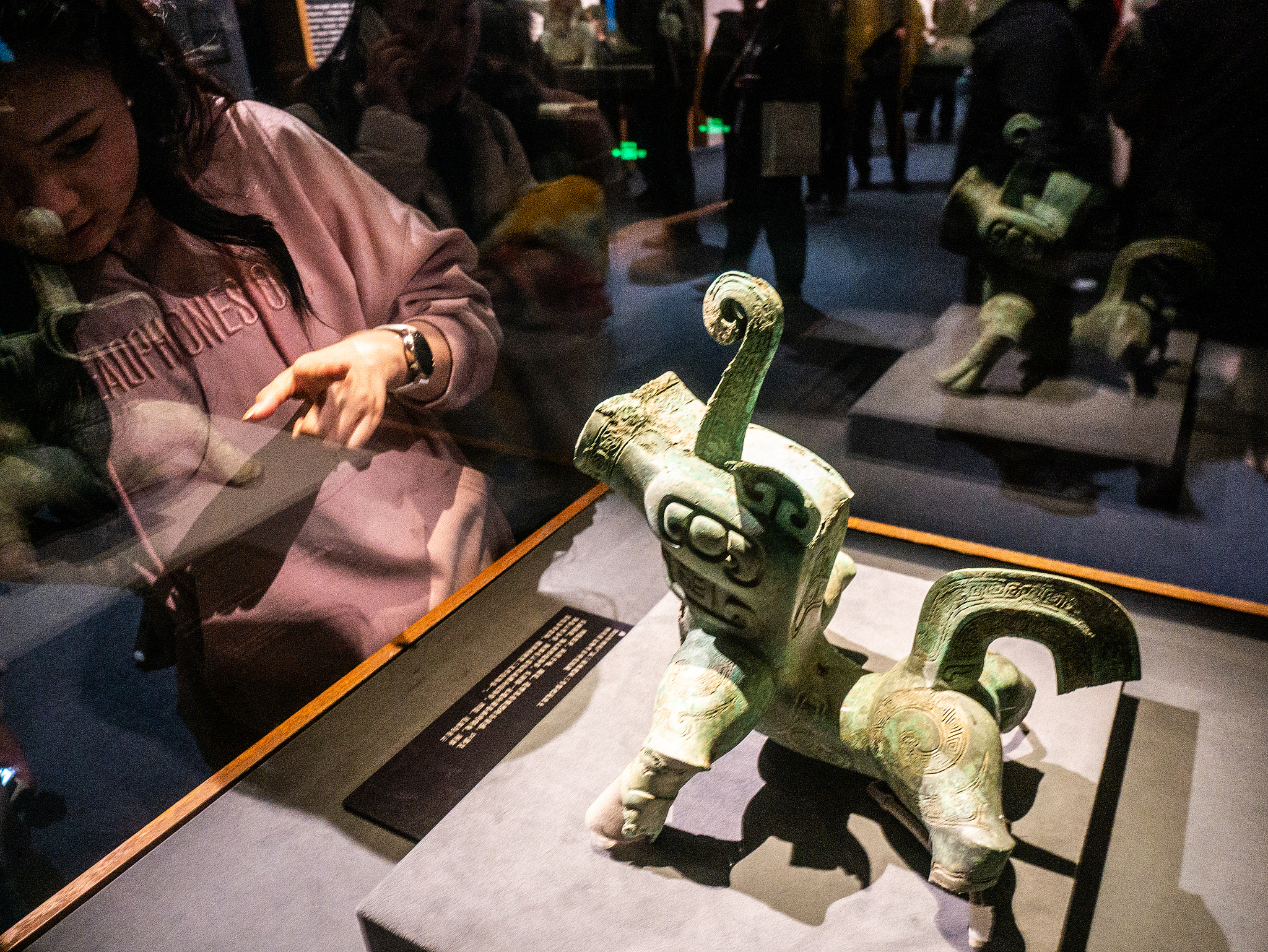 Visitors view artifacts unearthed at the Sanxingdui and Jinsha sites, at the National Museum of China, Beijing, February 19, 2026. /CFP