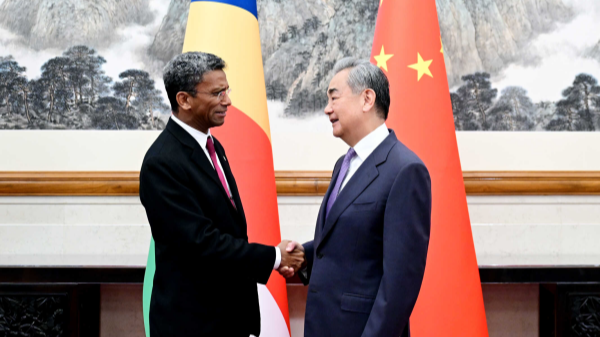 Chinese Foreign Minister Wang Yi (R), also a member of the Political Bureau of the Communist Party of China Central Committee, holds talks with Barry Faure, minister of foreign affairs and diaspora of Seychelles, in Beijing, China, May 18, 2026. /Chinese Foreign Ministry