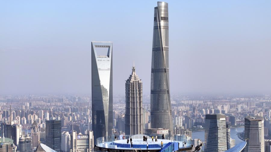 Visitors enjoy the cityscape from The Stage, a new observation deck atop the White Magnolia Plaza in Shanghai, east China, April 14, 2025. /Xinhua
