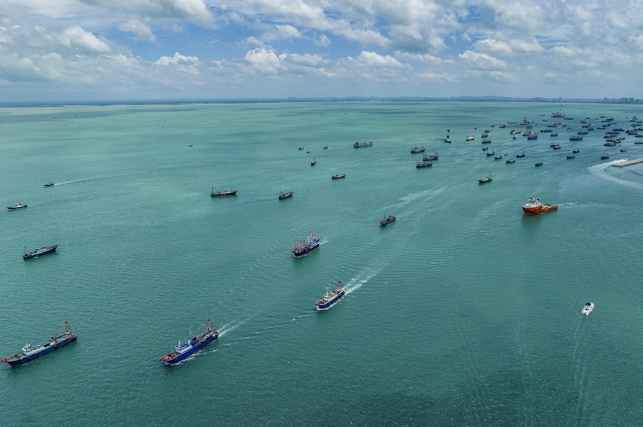 Fishing boats head out to sea as the fishing moratorium ends in the Beibu Gulf, Guangxi Zhuang Autonomous Region, south China, August 16, 2025. /VCG