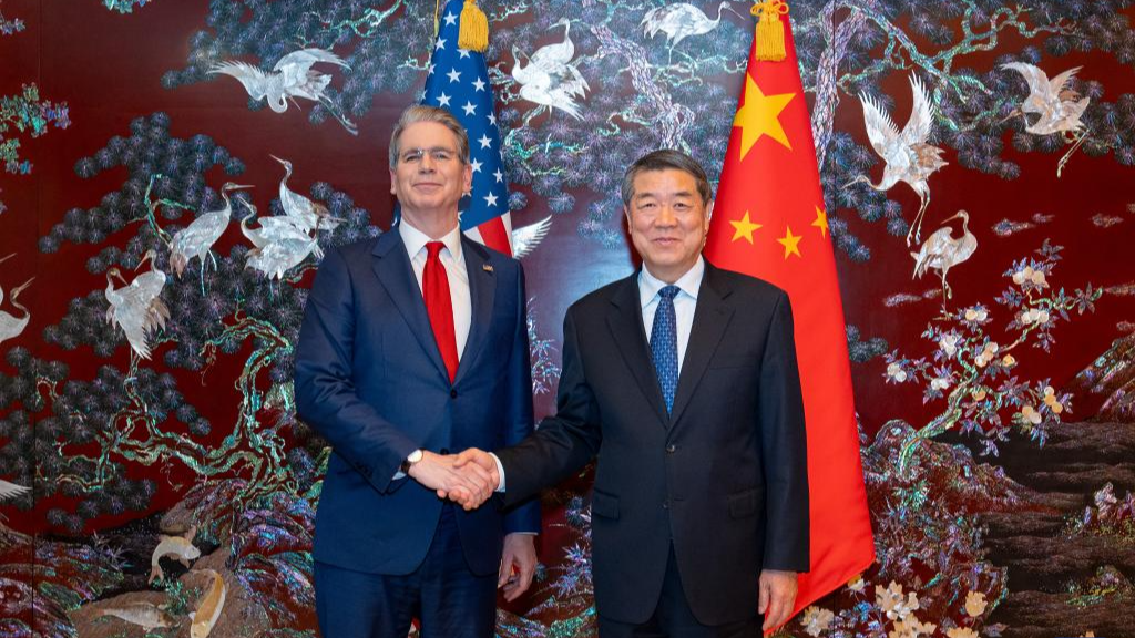 Chinese Vice Premier He Lifeng (R) shakes hands with US Treasury Secretary Scott Bessent prior to their consultations in the Republic of Korea, May 13, 2026. /Xinhua