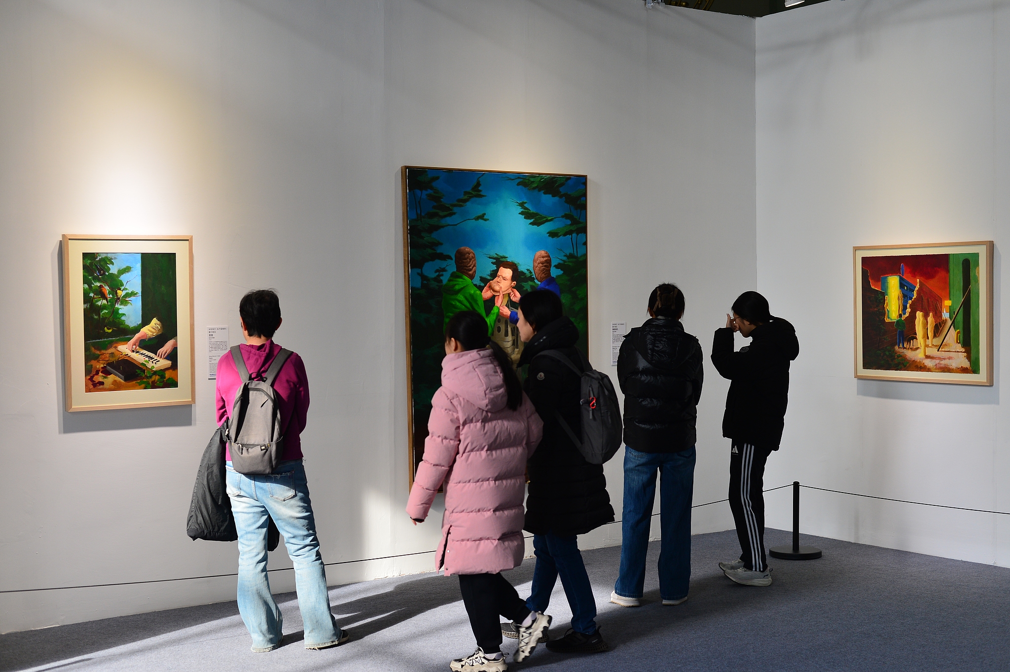 A photo taken in January 2026 shows visitors enjoying a contemporary Serbian art show in Beijing. /VCG