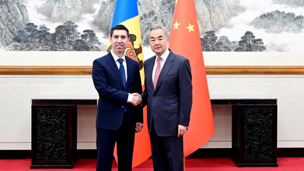 Chinese Foreign Minister Wang Yi talks with Deputy Prime Minister and Minister of Foreign Affairs of Moldova Mihai Popsoi, Beijing, capital of China, May 21, 2026. /Chinese Foreign Ministry