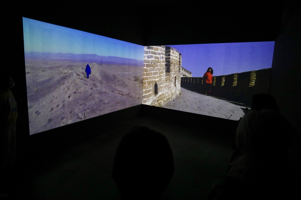 This undated photo shows Marina Abramovic's The Lovers, The Great Wall Walk on display at an exhibition in Beijing. /IC