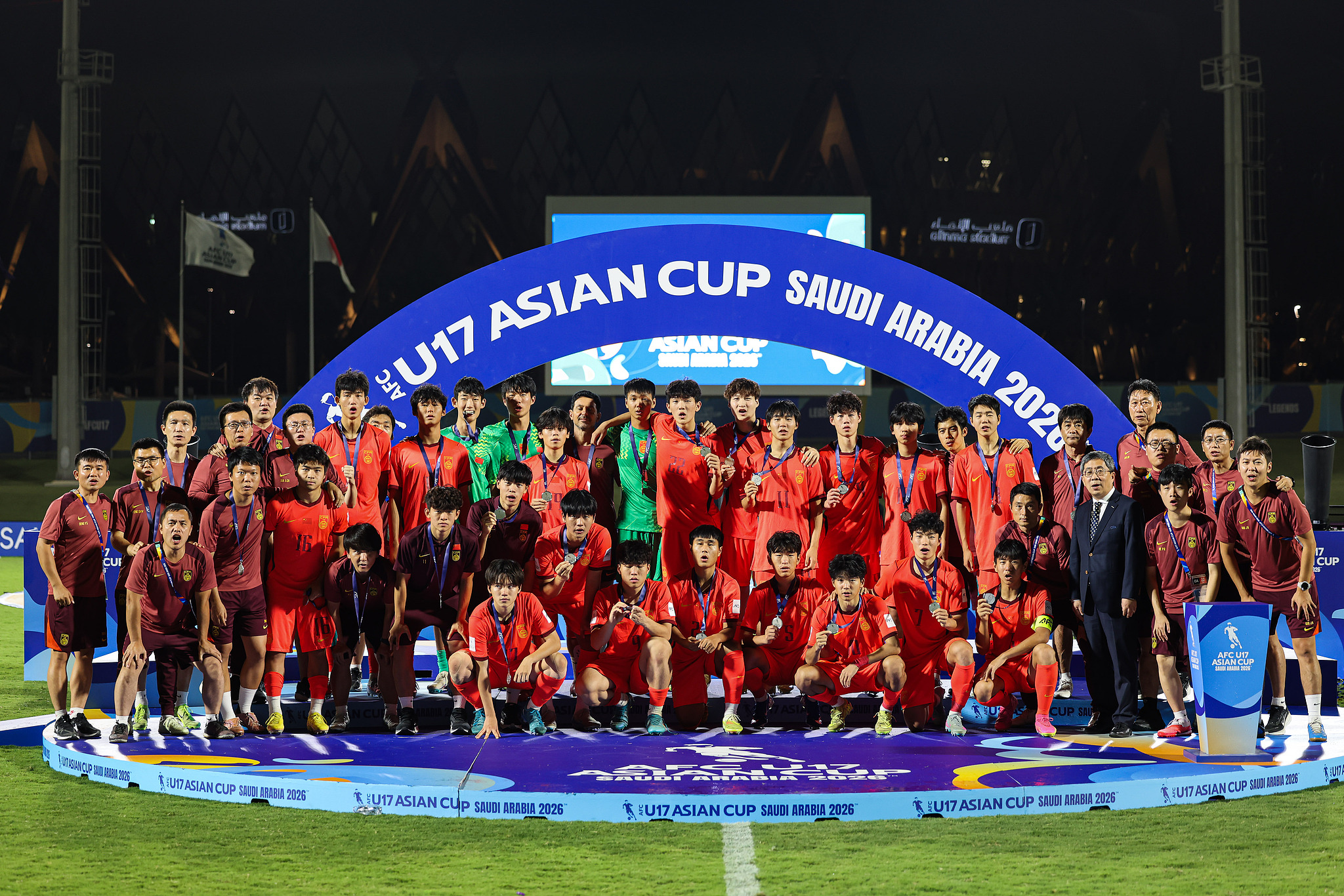 China players pose for group photo after the AFC U17 Asian Cup final in Jeddah, Saudi Arabia, May 22, 2026. /VCG